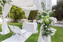Close-up of a bouquet of of amazing flowers and decorations for a wedding.